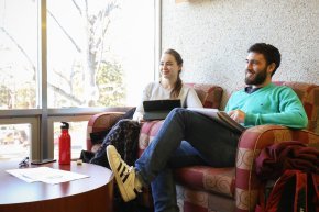 Students collaborating in the library