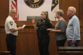 Grayson Cameron being sworn in as a sheriff's deputy