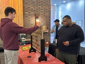Students play giant Connect Four in the Play Pin
