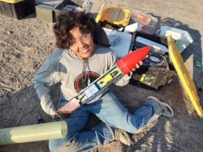 Demmi Ramos working on a rocket before launch