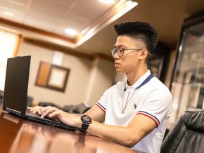 Ringo Nguyen working at a computer