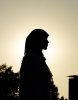 Silhouette of a female student's profile