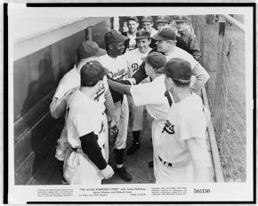 Jackie Robinson with Dodgers in the dugout