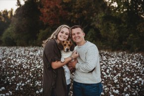 Shelbey Taylor, fiance and dog in a cotton field