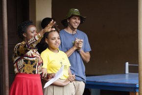 Harrison Hickman with True to Tanzania staff members