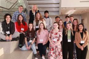 LR students take a group photo by main stairs at NCAS meeting