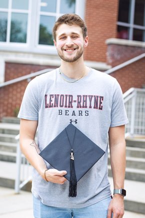 Colby Mashburn standing in front of the McCrorie Center