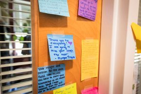 Close up of post it notes on Toni Oakes' office door with a message of love from students