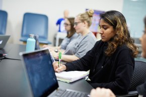 PA students in classroom with laptops and notebooks visible