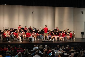 Summer music band performs on stage in PE Monroe