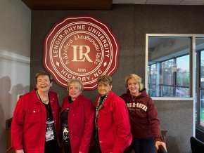 Martha, Carolina, Anna and Harriet in front of the LR seal in the presidential suite