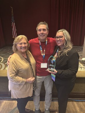 Lauren Mena with her mother and Neil Gray at the 2025 NCSCA conference.