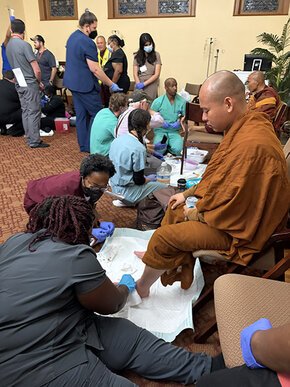 Walk for Peace monks receiving medical treatment in Columbia