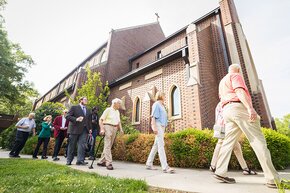 Visiting LTSS alumni walking into Grace Chapel