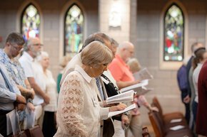 LTSS alumni participate in a chapel service in Grace Chapel