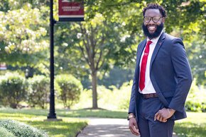 Dominic Jackson smiling on the quad