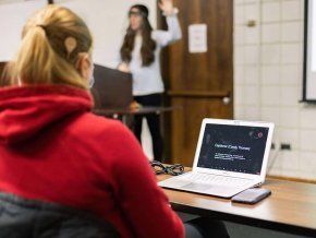 A student utilizes a computer translator.