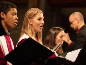 Choir singing in chapel during concert