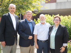 Andy Anderson, Fred Whitt, Robert Fritz and Jennifer Burris together on campus