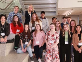 LR students take a group photo by main stairs at NCAS meeting