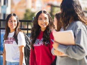 Four LR students walking on City Walk in Hickory