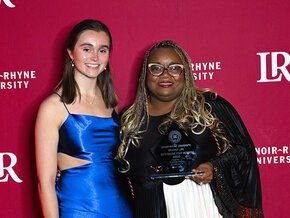 Anna Buchert presents outstanding staff member award to Normandy Schenck