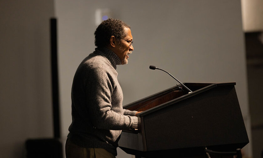 Percival Everett at the podium in PE Monroe Auditorium