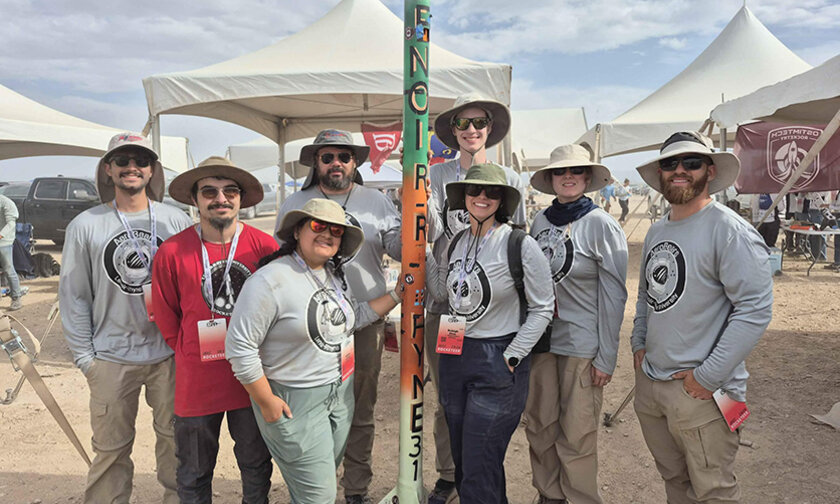 2026 Aerobears rocket team, 8 members, at IREC with their rocket