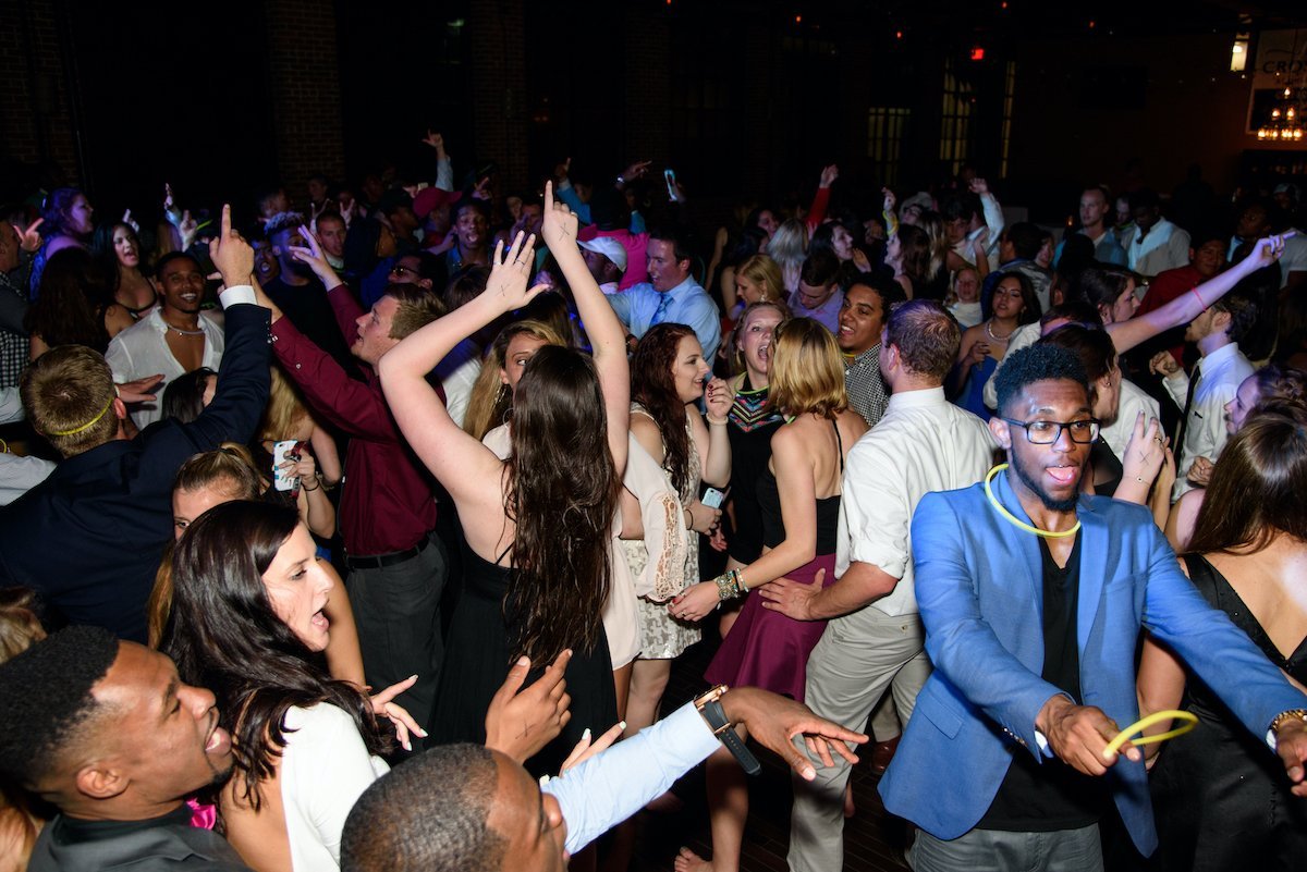 Students in formal attire dance