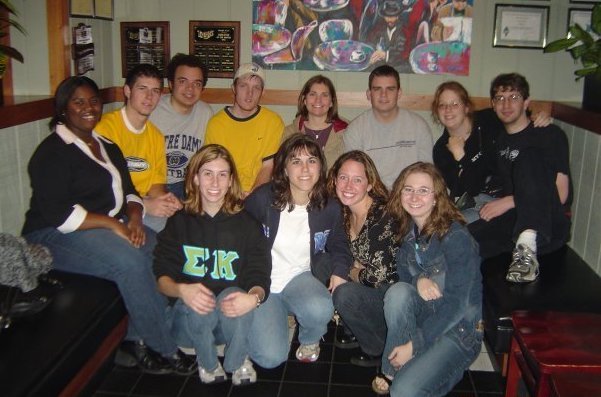 Photo from the early 2000s of college students in a dorm room