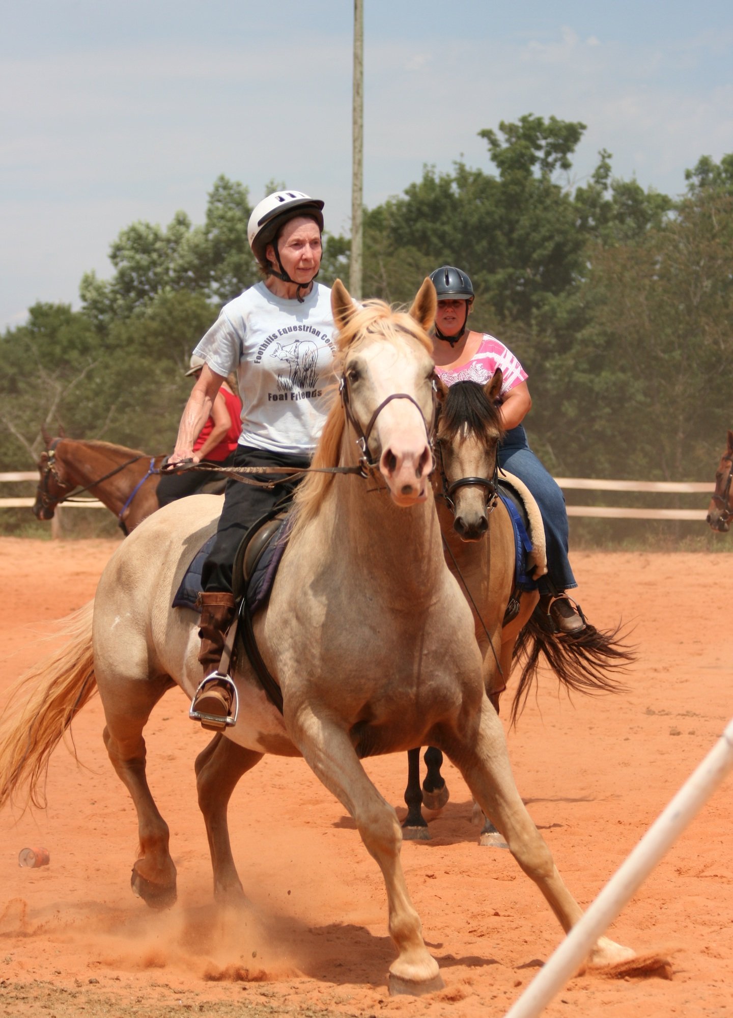 Katherine Pasour rides on horseback