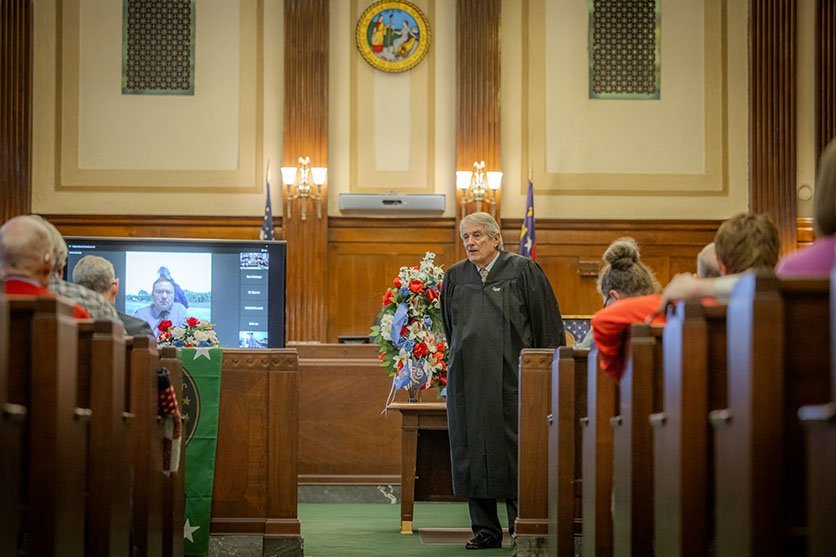 Judge Marvin Pope addresses Veterans Treatment Court graduation.