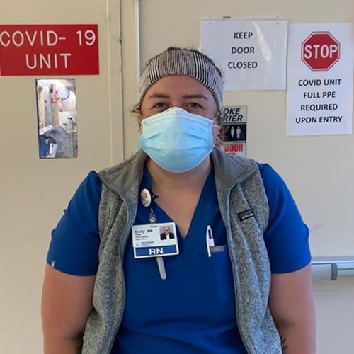 LR alumna Milly Treu wearing a mask in a COVID-19 unit.