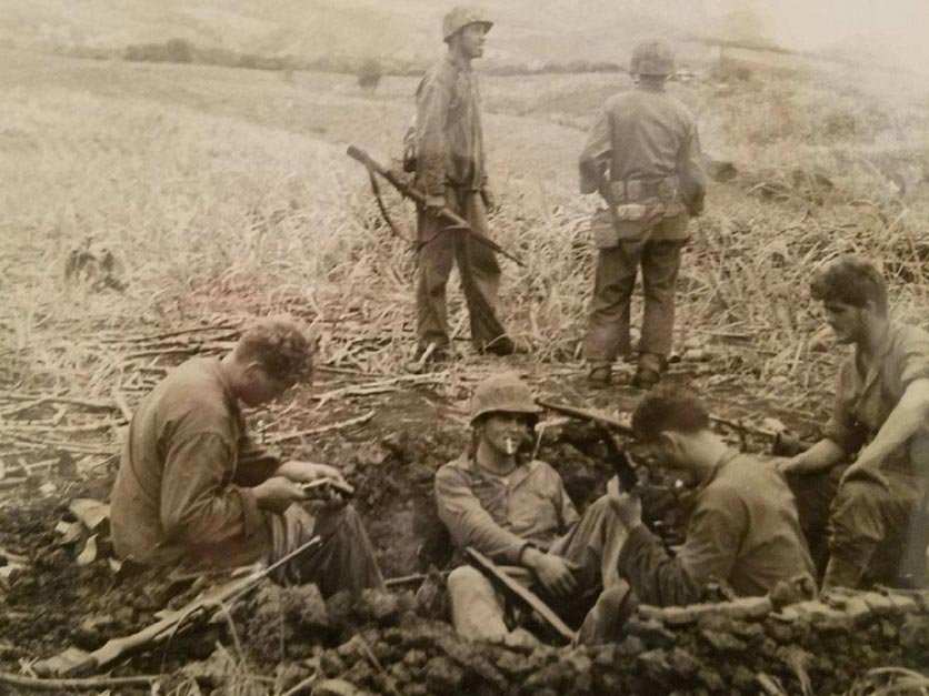 Hanley Painter in a fox hole on Iwo Jima.