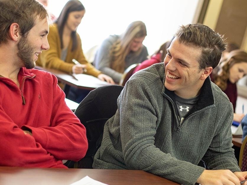 Students laughing in class.