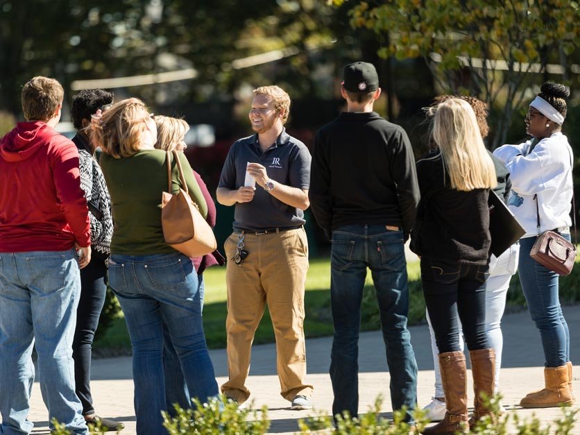 Prospective students and parents take part in a campus tour