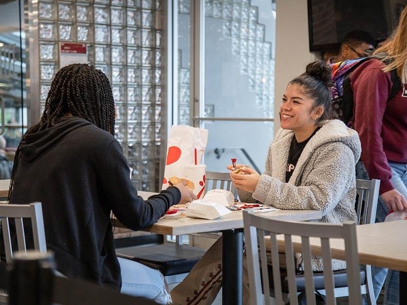Students eating Chick-fil-A at the new campus restaurant