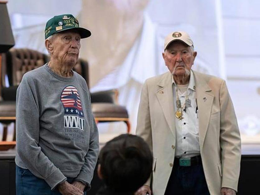 World War II veterans at the showing of a documentary about D-day directed by an LR professor