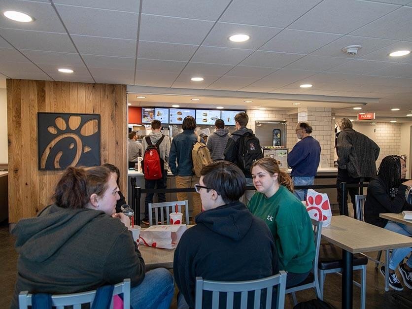 Students eating at the Chick-fil-A restaurant on campus