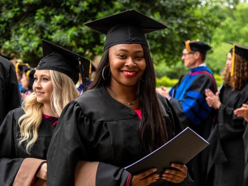 Smiling student at commencement