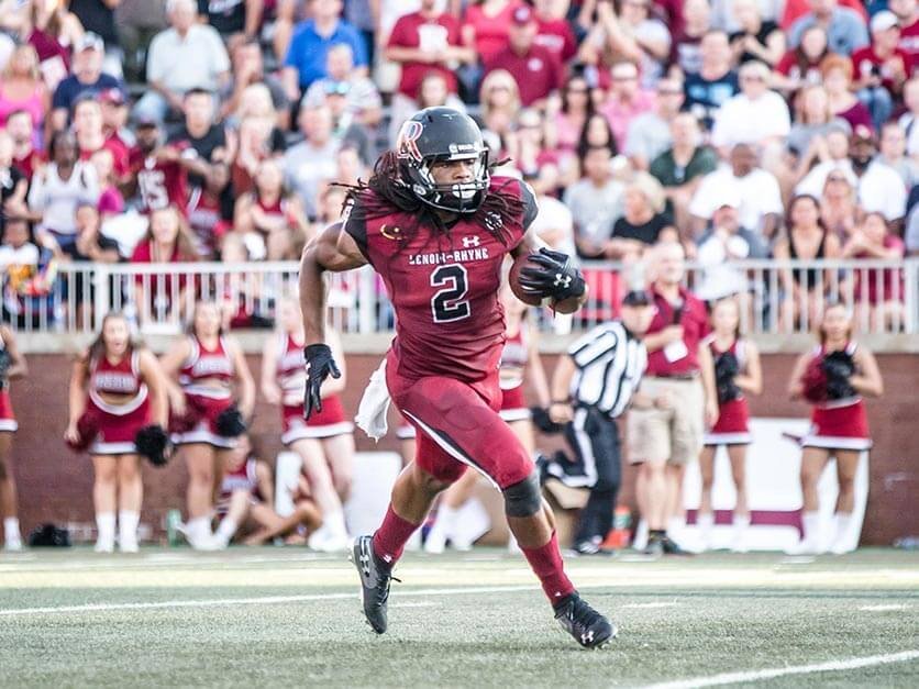 Former LR star Kyle Dugger running with the football