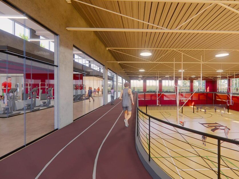 Architectural rendering showing interior court, track and fitness center
