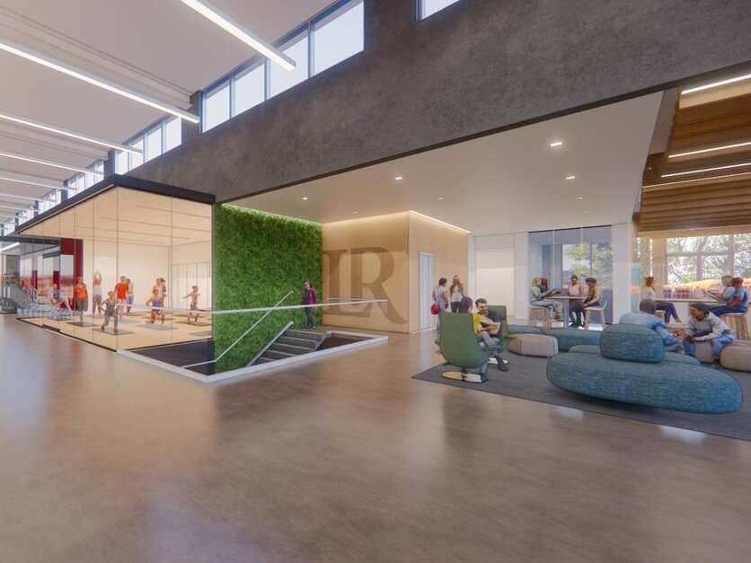 Architectural rendering showing interior lobby with gathered students and group fitness rooms