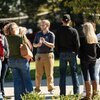 Prospective students and parents take part in a campus tour