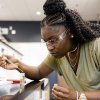 A student conducts research in a lab
