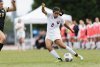 Aqsa Mushtaq plays soccer outside