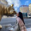 Kenzie Foyle with a bear statue in Paris