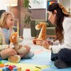 A behavior specialists talks with a child during a session