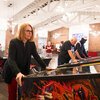 Summer McGee playing pinball in the Cromer Center lobby