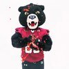 Joe Bear mascot throwing confetti